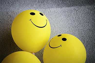 3-D yellow smiley-faced emojis